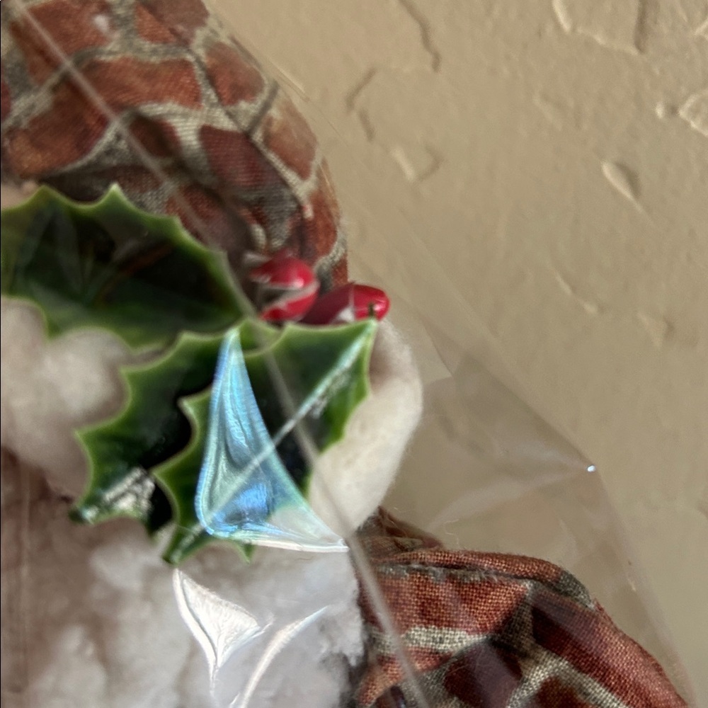 Festive Santa Claus Plush with Wreath and Stocking - Picture 9 of 9